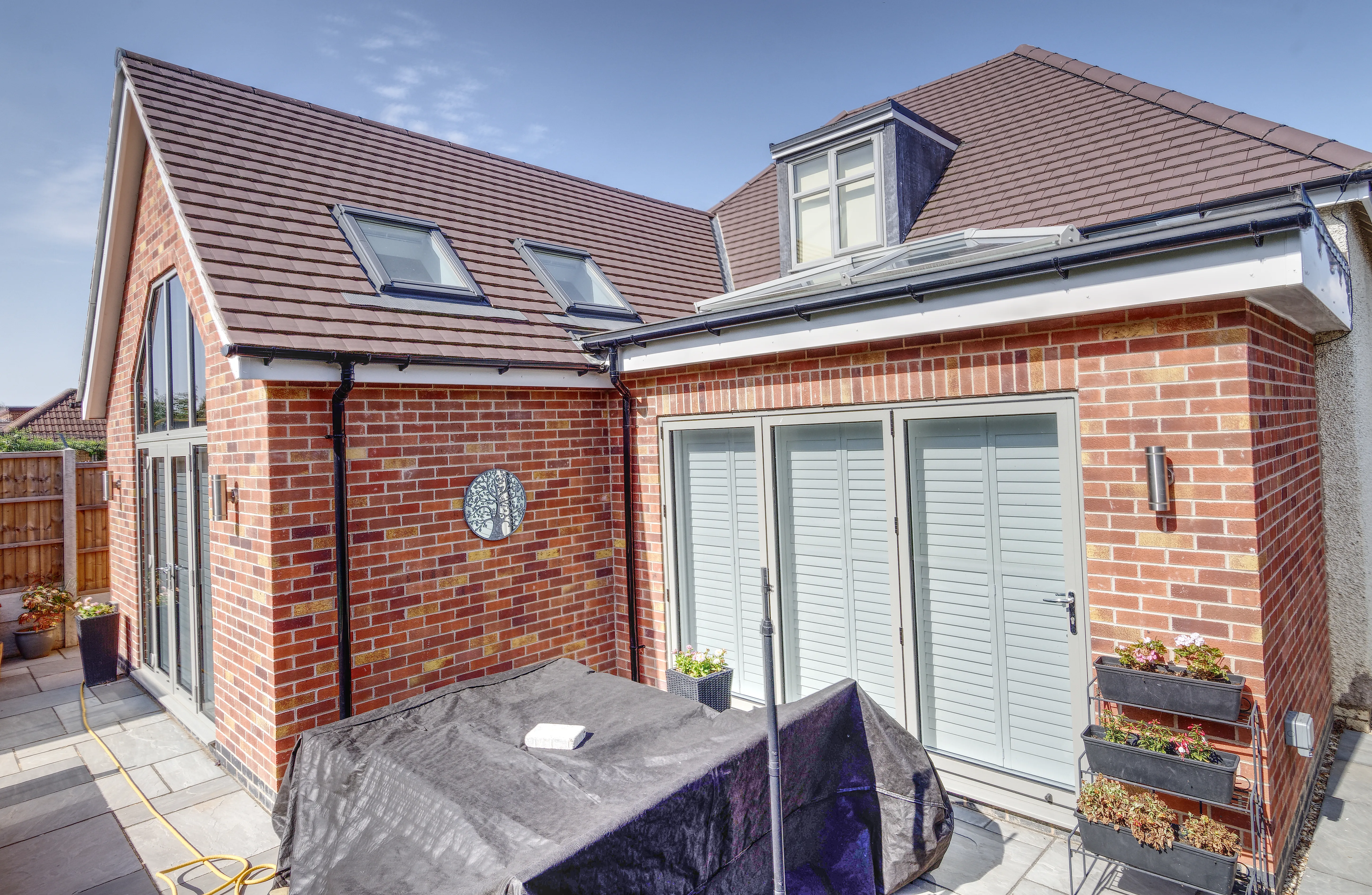 a house with a patio and a covered patio